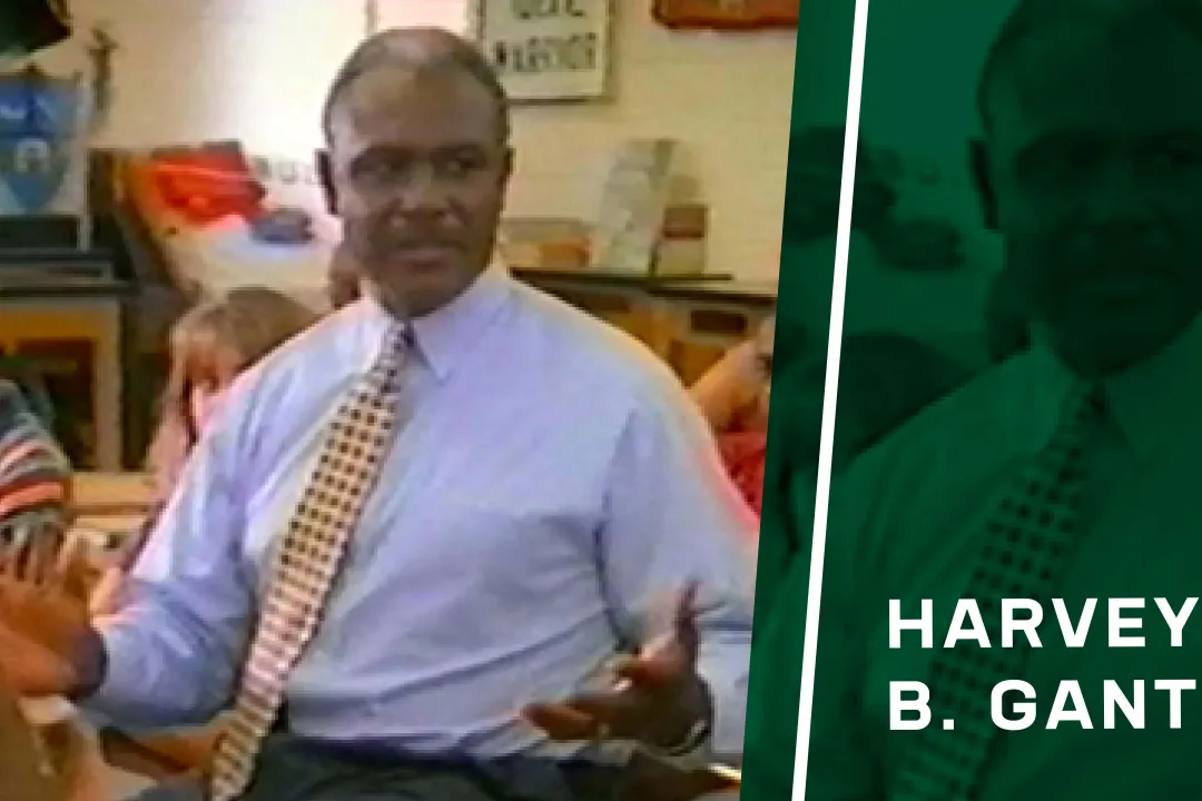 Video still from a campaign ad: Harvey Gantt speaking to a classroom of children